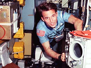 NASA/Mir-23 researcher Jerry Linenger floats in the Priroda module. 